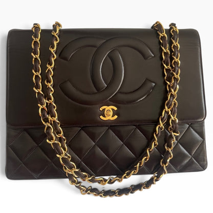 CHANEL Vintage Maxi Big Logo Flap Brown 24K product photograph 1 - VaultedVIP