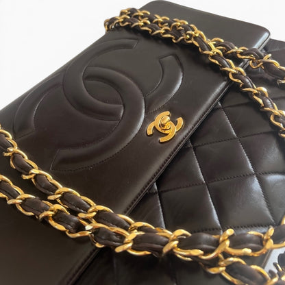 CHANEL Vintage Maxi Big Logo Flap Brown 24K product photograph 2 - VaultedVIP
