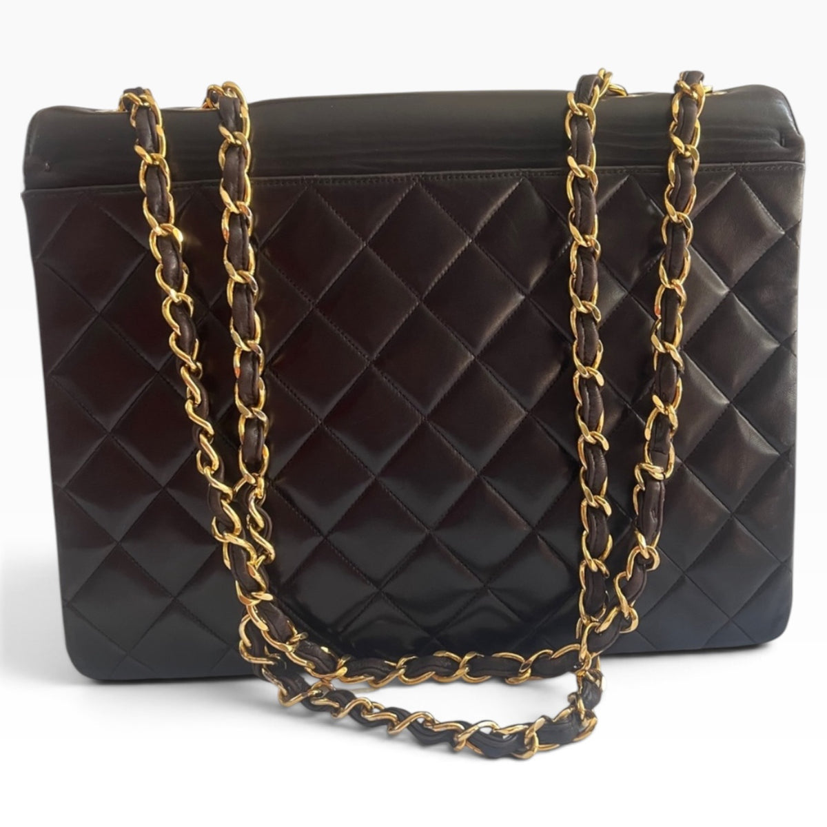CHANEL Vintage Maxi Big Logo Flap Brown 24K product photograph 3 - VaultedVIP