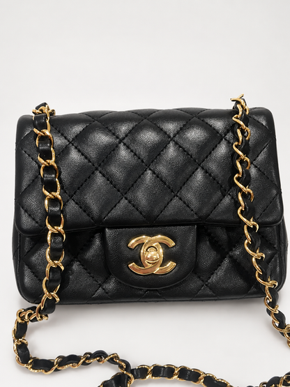 CHANEL Classic Mini Square Flap Black Lambskin Gold Hardware product photograph 1 - VaultedVIP