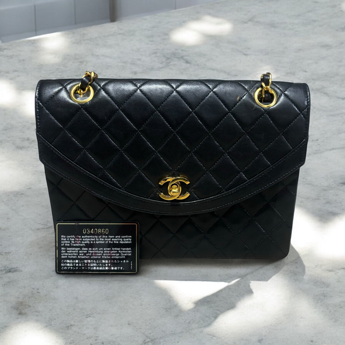 CHANEL Vintage 0 Series Classic Flap Black Lambskin 24K Gold product photograph 2 - VaultedVIP